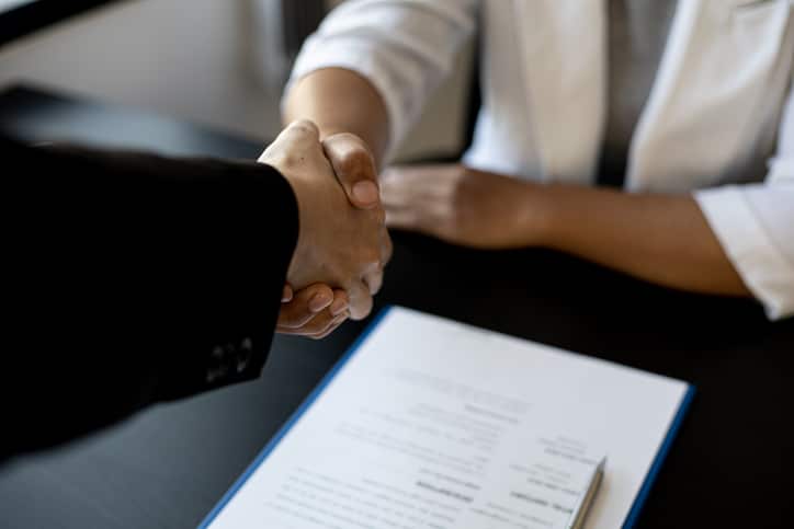 Two business men shaking hands